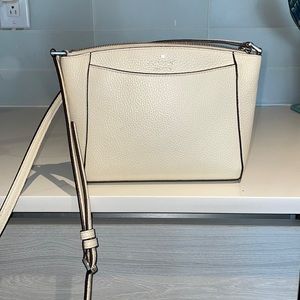 Buttermilk Kate Spade Cross body leather purse